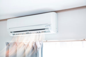 ductless Air conditioner blowing warm air